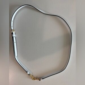 Brand new adjustable white  leather Moschino Belt with hooks on the end.
